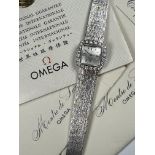 Omega for Turler 18ct white gold ladies wristwatch with 24 diamonds set to the case, black hands,