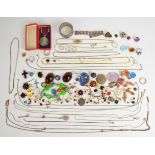 A collection of silver jewellery including a cross set with enamel, St Christopher, locket on chain,