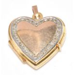 A 9ct gold heart shaped locket set with a border of diamonds, 3.1g