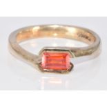 A 9ct gold ring set with an emerald cut fire opal, 4g, size N