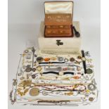 A collection of silver jewellery including chains, two rings, brooch, etc and costume jewellery