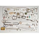 A collection of silver jewellery including thirteen rings set with marcasite, amethyst, abalone,
