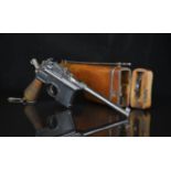Deactivated German C96 'Broom Handle' Mauser machine pistol with wooden grips, adjustable sights,