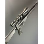 RWS Scimitar .22 PCP air rifle with composite stock, textured pistol grip, sound moderator, 8-shot