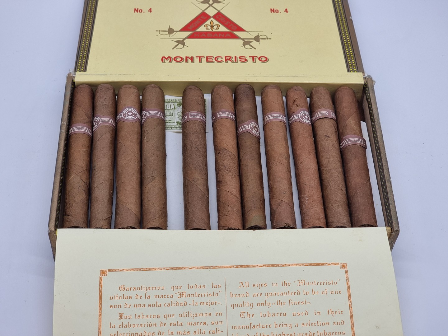 A part box of twenty three Montecristo No.4 Cigars.