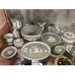 A collection of green Wedgwood Jasperware comprising two large vases, four smaller vases, a