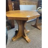 A Robert Mouseman Thompson oak octagonal coffee table, on cruciform base, with carved mouse, 49.
