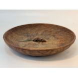 A Robert Mouseman Thompson adzed oak fruit bowl, with carved mouse to centre, 29cm diameter