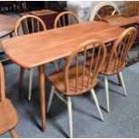 An Ercol Mid-Century Elm and Beech 'Plank' rectangular Dining Table and Chair Set Circa 1960s.