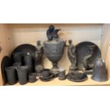A collection of Wedgwood black basalt wares including a large wine ewer styled with Bacchus