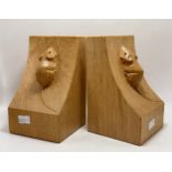 Robert Thompson, a pair of Mouseman oak bookends, of typical form, each with carved mouse signature;