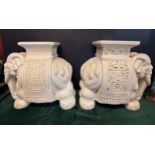 A pair of white ceramic elephant garden stools / plant stands. H 43cm W 50cm D 22cm