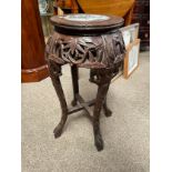 A Chinese fruitwood stool/plant stand, formed as bamboo with marble inset top, 61cm high, 31cm wide