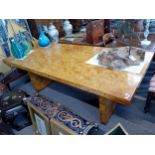 An Iain James Art Deco style burr walnut 'Polar' veneered dining table