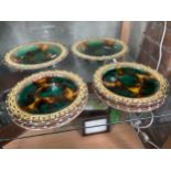A Wedgwood Majolica dessert service, formed of eight plates and two tazzas, all with pierced rims,