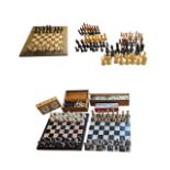 A COLLECTION OF VINTAGE CHESS SETS AND ASSOCIATED EPHEMERA To include a metallic set, a carved