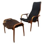 YNGVE EKSTRÖM, SWEDISH, 1913 - 1998, FOR SWEDESE MÖBLER AB: A 'Lamino' oak lounge chair and ottoman,