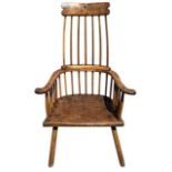 AN 18TH CENTURY GEORGE III ASH AND ELM PRIMITIVE COMB BACK ‘LOBSTER POT’ WINDSOR ARMCHAIR (