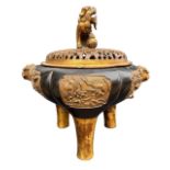 A 17TH CENTURY CHINESE MING DYNASTY PARCEL GILT BRONZE CENSOR AND COVER Having six engraved and