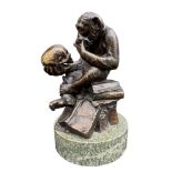 AFTER WOLFGANG HUGO RHEINHOLD (1853-1900). ‘AFFE MIT SCHÄDEL’ (APE WITH SKULL). BRONZE SCULPTURE