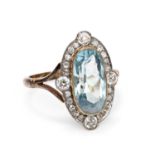 An aquamarine and diamond ring,