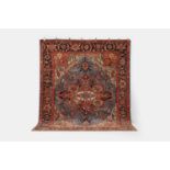 A wool carpet of Persian Heriz design, of recent manufacture,