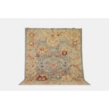 An Oushak wool carpet, of recent manufacture,