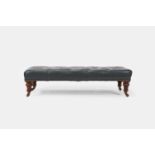 A leather ottoman, 20th century,