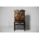 A Queen Anne black-and-gilt japanned cabinet-on-stand, early 18th century,