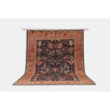 A wool carpet of Persian Heriz design, of recent manufacture,