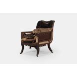 A George IV mahogany upholstered bergère armchair, circa 1830,