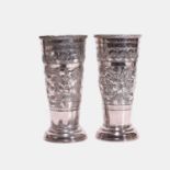 An unusual pair of plated Britannia metal 'Cruft's Dog Show' trumpet vases, circa 1900,