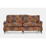 An upholstered two-seater sofa in the Howard & Sons style, of recent manufacture, by Duresta,