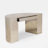 Manner of Karl Springer, a desk,
