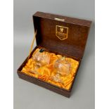 A cased pair of Edinburgh Crystal cut glass brandy balloons - 11.6cm high.