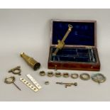 A late 19th Century Gould type pocket microscope - in lacquered brass complete with mirror and