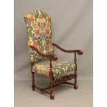 A high-back carved mahogany open arm chair in the 18th century French taste - late-20th century, the