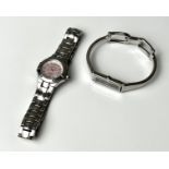 Two ladies bracelet  watches - comprising a Gucci stainless steel bangle watch, ref. 1500L, with