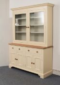 A Neptune light oak and cream-painted kitchen dresser - the ogee cornice over a pair of glazed doors