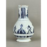 A Delft bottle vase in the Chinese Kangxi style - c.1700, with an everted rim and flared circular
