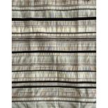 A pair of handmade curtains in John Lewis horizontal stripe weave in black and shades of taupe and