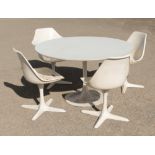 Maurice Burke for Arkana: a 'Tulip' dining table and four 'Star' chairs - originally designed