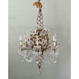A gilt metal and coloured and cut glass six light chandelier - early 20th century, probably