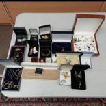 LARGE SELECTION OF COSTUME JEWELLERY INCLUDING NECKLACES, PENDANTS, BROOCHES, BANGLES ETC.