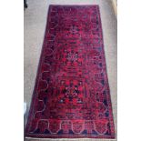 RED AND BLUE MIDDLE EASTERN RUNNER,