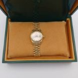 ROLEX 18CT GOLD PERPETUAL DATEJUST LADIES WRISTWATCH ON AN 18CT GOLD BRACELET - 64.