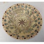 19TH CENTURY SEATON POTTERY DAIRY BOWL DECORATED WITH PEACOCKS, FLOWERS & 8-POINT COMPASS STAR.