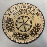 19TH CENTURY SEATON POTTERY DAIRY BOWL DECORATED IN CREAM & BROWN WITH THISTLES & AN 8 POINT STAR.