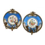 A Pair of Gilt-Metal-Mounted Sèvres-Style Porcelain Wall Sconces, circa 1900, of circular form