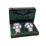 A Pair of Sèvres-Style Porcelain Coffee Cups and Saucers with White Metal Mounts, 20th century, pink